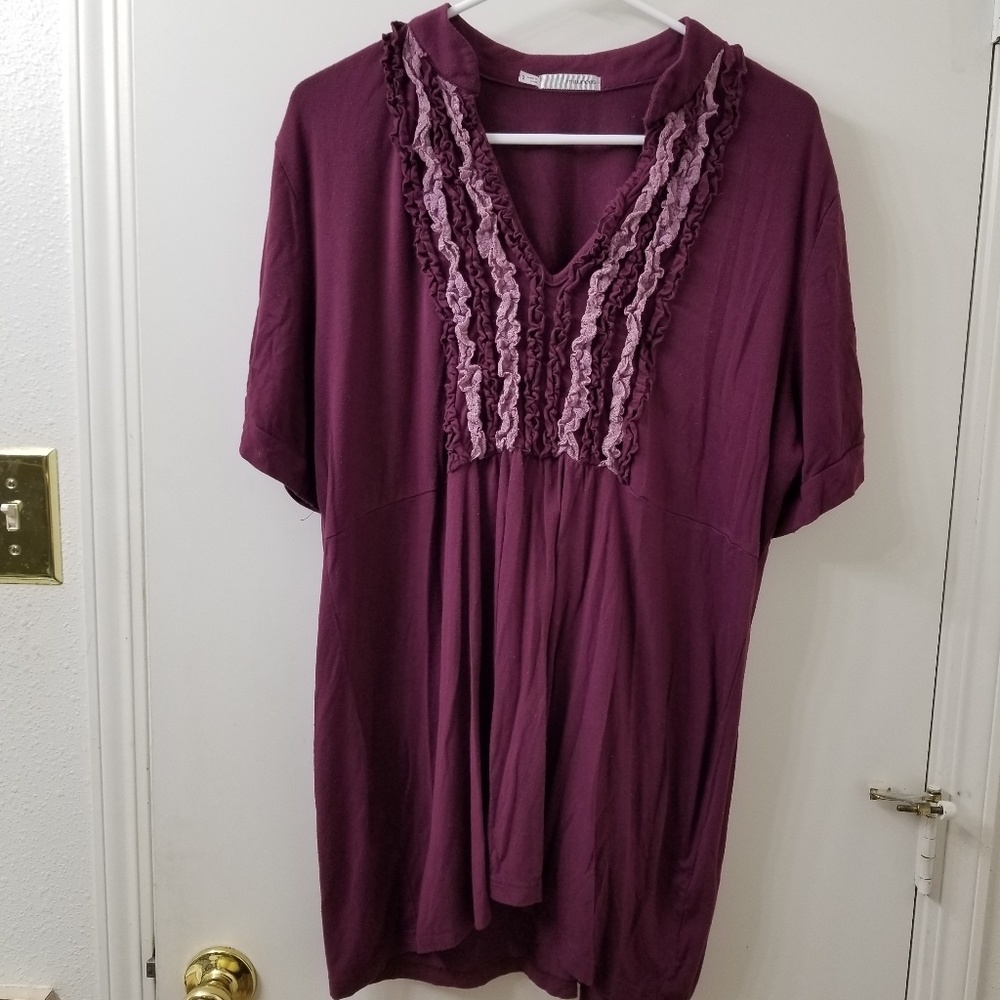 Maurice's maroon shirt